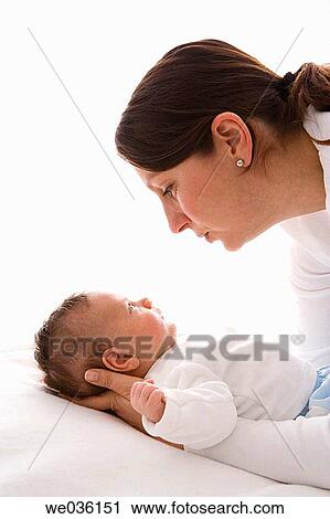 Mother and newborn baby View Large Photo Image Stock Image - Mother and newborn baby. Fotosearch