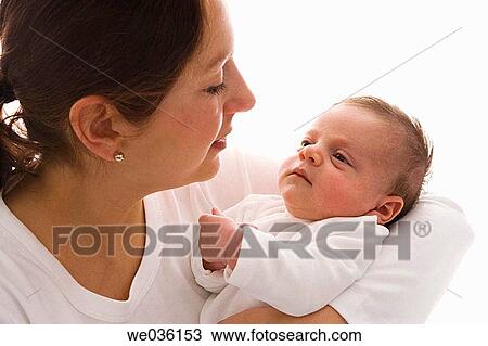 Mother and newborn baby View Large Photo Image Stock Image - Mother and newborn baby. Fotosearch