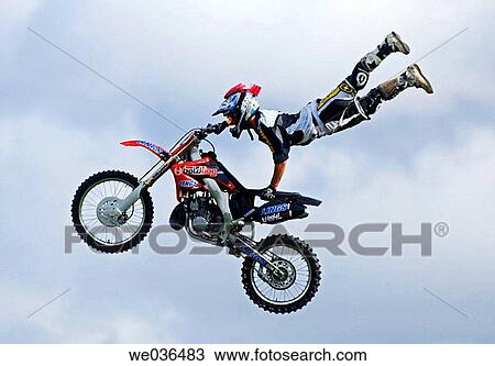 Motorbike Stunt display show at Stoneleigh Coventry England UK View Large Photo Image Stock Image - Motorbike Stunt display show at Stoneleigh Coventry England UK. Fotosearch