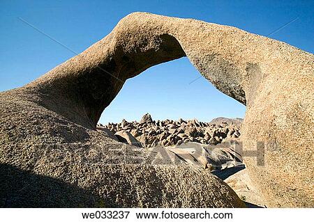 Natural stone arch in the Alabama Hills, Eastern Sierras. Bishop, California, USA View Large Photo Image Stock Photo - Natural stone arch in the Alabama Hills, Eastern Sierras. Bishop, California, USA. Fotosearch