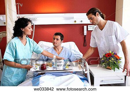 Nurses and patient in hospitalization View Large Photo Image Stock Image - Nurses and patient in hospitalization. Fotosearch