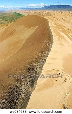 Stock Image - One of the longest dunes in the world (100 km. ), Gobi desert. Mongolia. Fotosearch