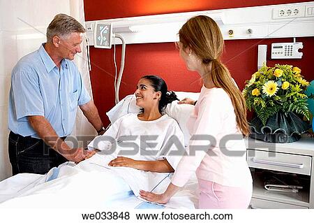 Patient and relatives in hospitalization View Large Photo Image Stock Photo - Patient and relatives in hospitalization. Fotosearch