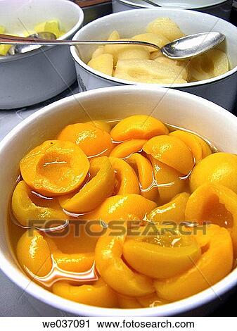 Peaches in syrup View Large Photo Image Stock Image - Peaches in syrup. Fotosearch