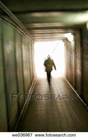 Person in tunnel View Large Photo Image Stock Photo - Person in tunnel. Fotosearch