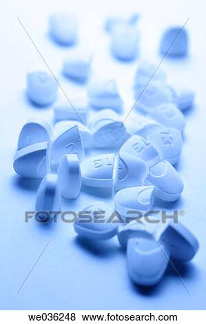 Pills in halves View Large Photo Image Stock Photo - Pills in halves. Fotosearch