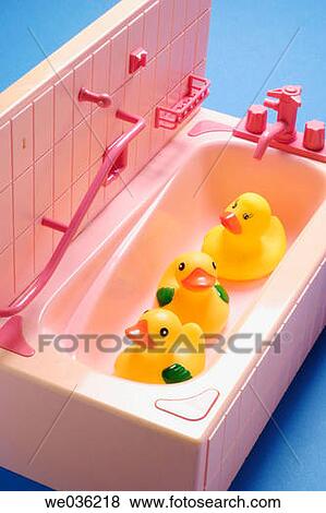 Rubber duckies in toy bathtub View Large Photo Image Stock Photo - Rubber duckies in toy bathtub. Fotosearch