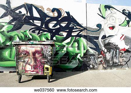 Rubbish container with a face painted on it. View Large Photo Image Stock Image - Rubbish container with a face painted on it.. Fotosearch
