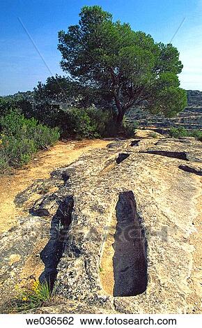 Saladar Tombs, tombs of Arabic origin. El Cogul. Les Garrigues region. Lleida province. Catalunya. Spain. View Large Photo Image Stock Image - Saladar Tombs, tombs of Arabic origin. El Cogul. Les Garrigues region. Lleida province. Catalunya. Spain.. Fotosearch