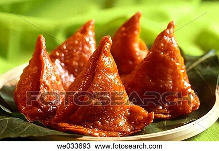 Samosa fried in sugar. India sweet snack. View Large Photo Image Stock Image - Samosa fried in sugar. India sweet snack.. Fotosearch