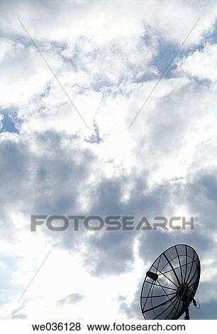 Satellite dish and storm clouds View Large Photo Image Stock Photo - Satellite dish and storm clouds. Fotosearch