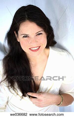 Sexy 30's caucasian woman smiling in camera View Large Photo Image Stock Image - Sexy 30's caucasian woman smiling in camera. Fotosearch