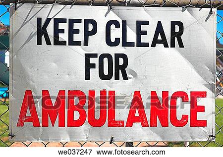Sign on fence requesting clear access for ambulance / emergency use. View Large Photo Image Stock Photo - Sign on fence requesting clear access for ambulance / emergency use.. Fotosearch