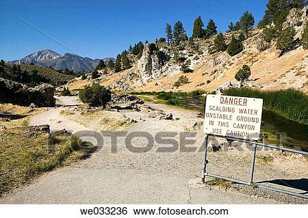 Sign warning of unstable ground, Hot Creek hot springs near Mammoth Lakes. California, USA View Large Photo Image Stock Photograph - Sign warning of unstable ground, Hot Creek hot springs near Mammoth Lakes. California, USA. Fotosearch