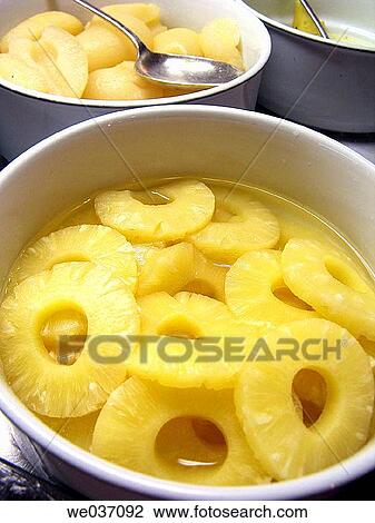 Sliced pineapple in syrup View Large Photo Image Stock Image - Sliced pineapple in syrup. Fotosearch