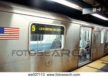 Subway train in Grand Central Station (American flag placed on many trains after the September 11th, 2001 incident), NYC. USA View Large Photo Image Stock Image - Subway train in Grand Central Station (American flag placed on many trains after the September 11th, 2001 incident), NYC. USA. Fotosearch