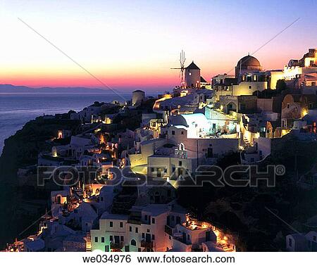 Sunset in Oia, Santorini island, Cyclades, Greece View Large Photo Image Stock Photograph - Sunset in Oia, Santorini island, Cyclades, Greece. Fotosearch