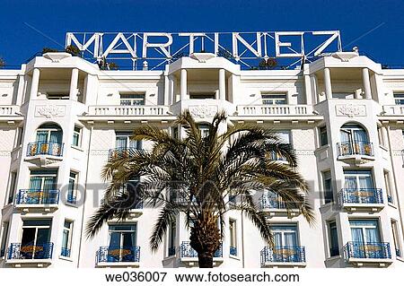 The Hotel Martinez is a 1930s palace displaying an elegance typical of the French Riviera and featuring Art Deco style throughout. It is located on the Croisette. Cannes. France. View Large Photo Image Stock Photo - The Hotel Martinez is a 1930s palace displaying an elegance typical of the French Riviera and featuring Art Deco style throughout. It is located on the Croisette. Cannes. France.. Fotosearch