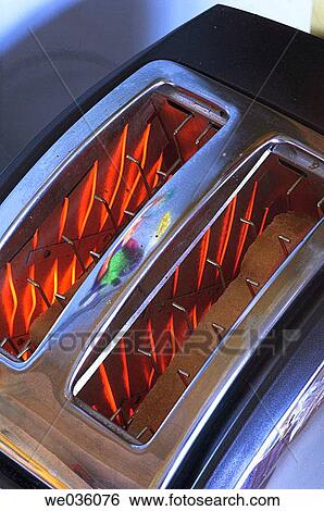 Toaster showing red hot elements View Large Photo Image Stock Photograph - Toaster showing red hot elements. Fotosearch