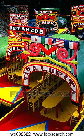 Stock Image - Trajineras (traditional ornated rafts), Xochimilco. Mexico D. F., Mexico. Fotosearch