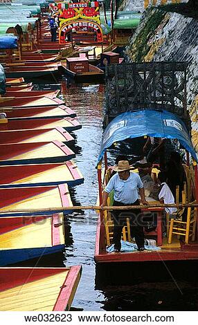 Trajineras (traditional ornated rafts), Xochimilco. Mexico D. F., Mexico View Large Photo Image Stock Image - Trajineras (traditional ornated rafts), Xochimilco. Mexico D. F., Mexico. Fotosearch