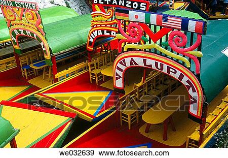 Trajineras (traditional ornated rafts), Xochimilco. Mexico D. F., Mexico View Large Photo Image Stock Photo - Trajineras (traditional ornated rafts), Xochimilco. Mexico D. F., Mexico. Fotosearch
