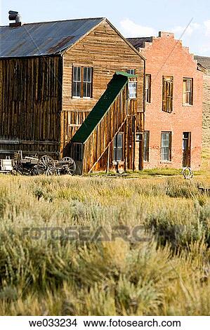 View of old wooden buildings of the ghost town, Bodie State Historic Park. Bodie, California, USA View Large Photo Image Picture - View of old wooden buildings of the ghost town, Bodie State Historic Park. Bodie, California, USA. Fotosearch