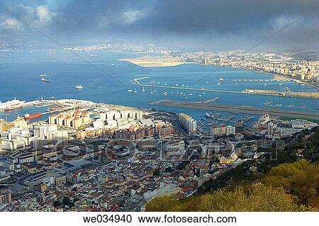 View over Gibraltar town and to La Linea de la Concepcion in Spain beyond on stormy day View Large Photo Image Stock Image - View over Gibraltar town and to La Linea de la Concepcion in Spain beyond on stormy day. Fotosearch