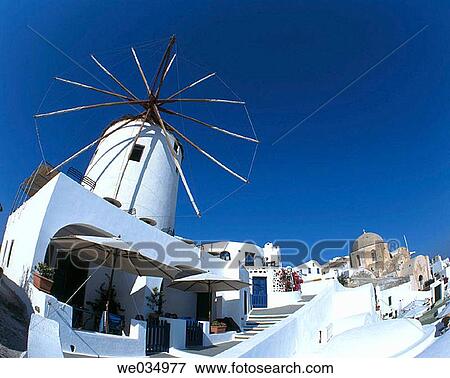Windmill in Oia, Santorini island, Cyclades, Greece View Large Photo Image Stock Photo - Windmill in Oia, Santorini island, Cyclades, Greece. Fotosearch