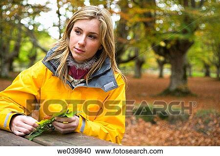 Stock Image - 30's, autumn, absorbed, 20's. Fotosearch