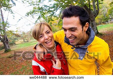 Stock Photo - 30's, autumn, amusement, affection, 20's. Fotosearch