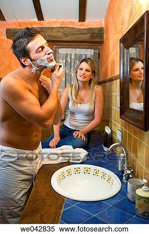 Stock Photography - 30's, bathroom, 20's. Fotosearch