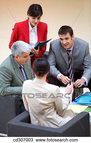 Stock Image - 30's, businessman, business, 20's. Fotosearch