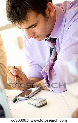 Stock Photography - 30's, businessman, business, agenda, 20's. Fotosearch