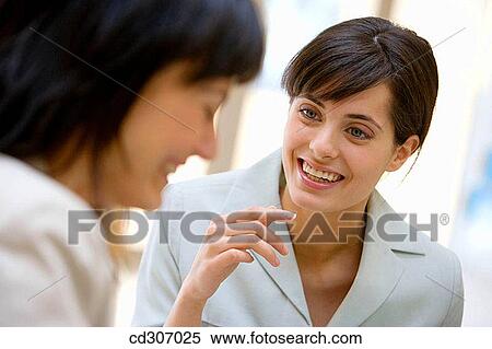 Stock Photography - 30's, businesswoman, businesspeople, business, 20's. Fotosearch