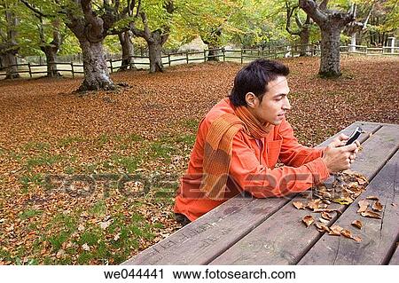 Stock Image - 30's, calling, autumn, 20's. Fotosearch