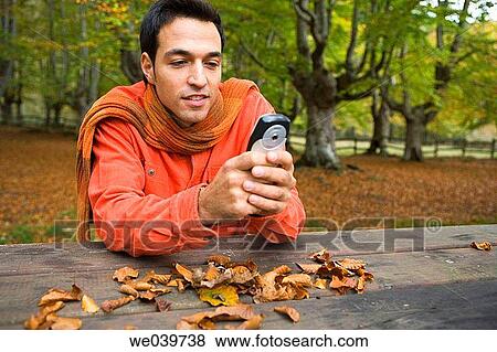 Stock Photo - 30's, calling, autumn, 20's. Fotosearch