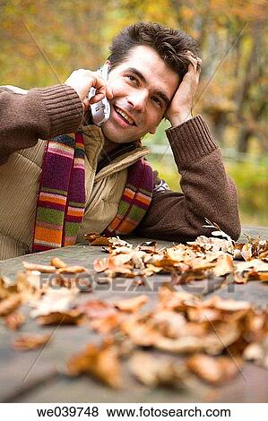 Stock Photo - 30's, calling, autumn, 20's. Fotosearch