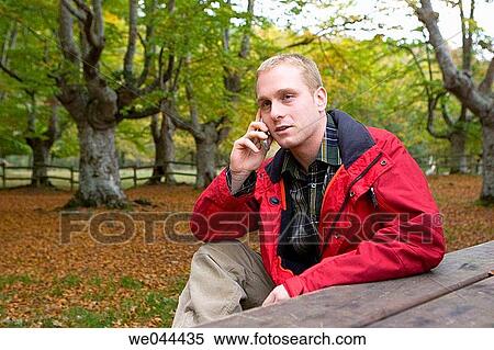 Stock Photography - 30's, calling, blond, autumn, 20's. Fotosearch