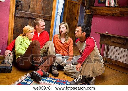 Stock Image - 30's, chat, 20's. Fotosearch