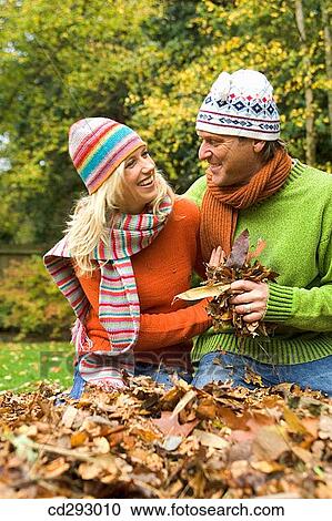 Stock Image - affection, bond, autumn, amusement, 30's. Fotosearch