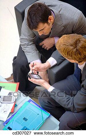 agenda, businesspeople, businessman, business, 30's View Large Photo Image Stock Photo - agenda, businesspeople, businessman, business, 30's. Fotosearch