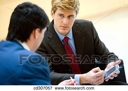 agenda, businesspeople, businessman, business, 30's View Large Photo Image Stock Photo - agenda, businesspeople, businessman, business, 30's. Fotosearch