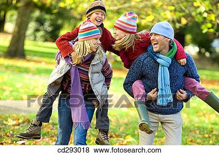 Stock Photo - amusement, boy, autumn, 30's. Fotosearch