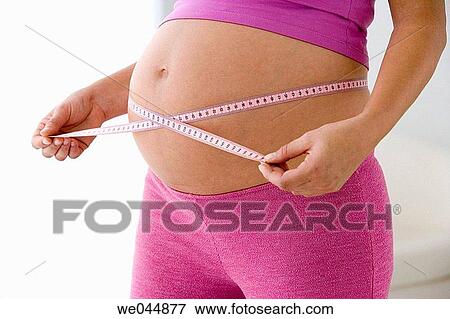 anonymous, belly, at-home, activity View Large Photo Image Stock Photo - anonymous, belly, at-home, activity. Fotosearch