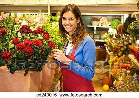 Stock Photograph - apron, brunette, 30's. Fotosearch