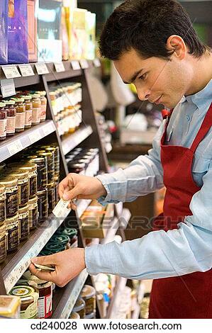 Stock Photo - apron, checking, check, 30's. Fotosearch