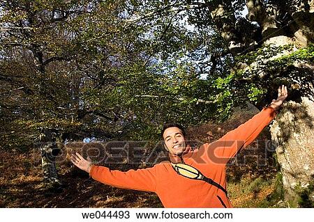 Arms raised, carefree, autumn, Arms open View Large Photo Image Stock Image - Arms raised, carefree, autumn, Arms open. Fotosearch