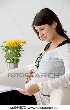 at-home, calm, browsing, browse, armchair View Large Photo Image Stock Image - at-home, calm, browsing, browse, armchair. Fotosearch