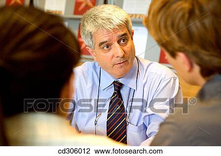 attentive, businessman, business, baby boomer, attention View Large Photo Image Stock Image - attentive, businessman, business, baby boomer, attention. Fotosearch